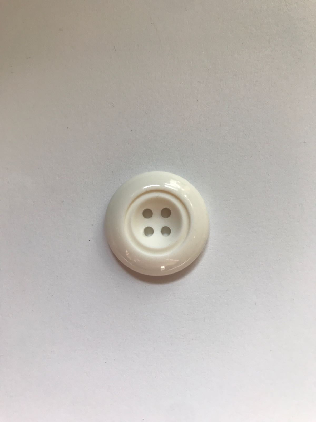 Plastic button 23 mm
