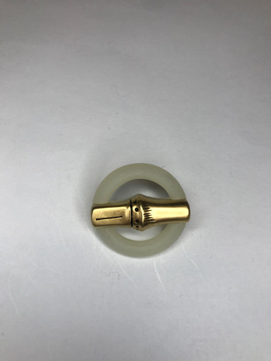 Plastic button with gold bamboo 24 mm