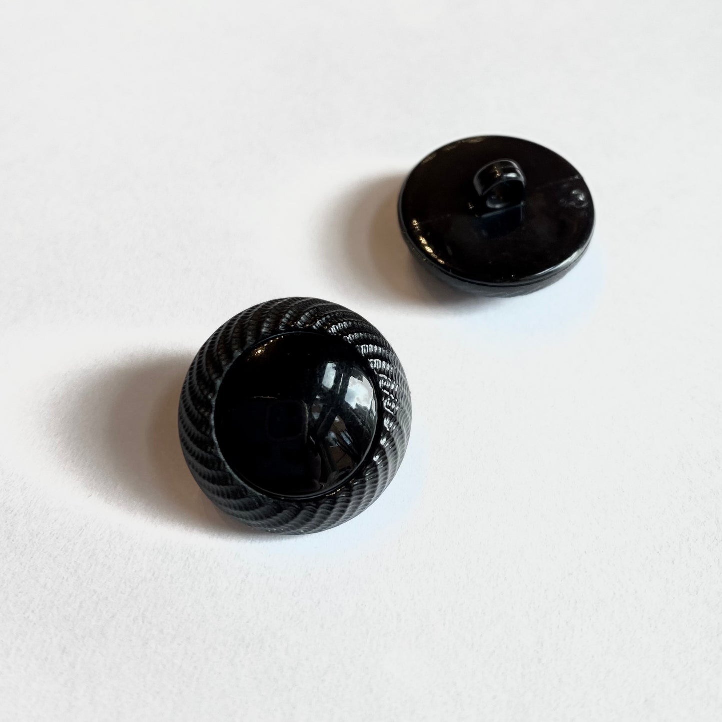 Black plastic button 18 mm