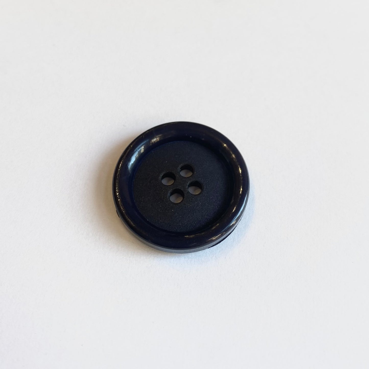 Navy blue plastic button 22 mm